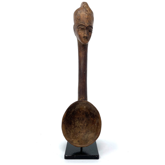 Baule Spoon with Female Head from Ivory Coast mounted on Black Metal Base.