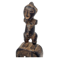 Baule-Style Heddle Pulley with Anthropomorphic Figure from Ivory Coast/Côte d’Ivoire