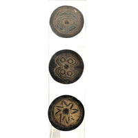 Set of Three Abelam Coconut Shell Tops/Children's Toys with Incised Designs and Acrylic Stand from Papua New Guinea (PNG)