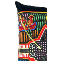 Colorful decorative pillow with geometric patterns on a black background