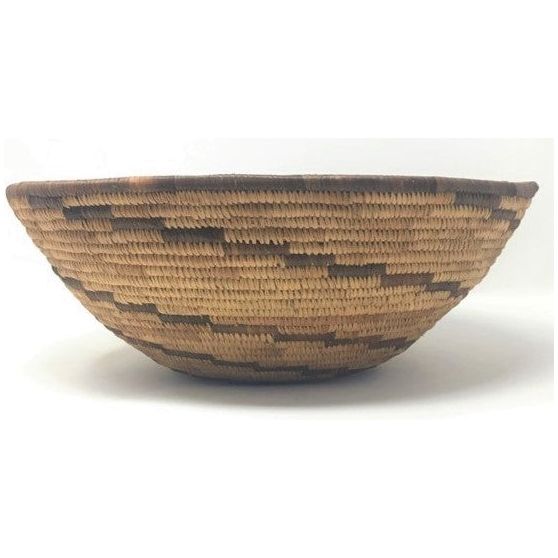 Vintage Botswana Basket with Neutral Coloration and Circular Zigzag Design in Dark Brown Measuring 13 Inches Diameter by 4.5 Inches Tall