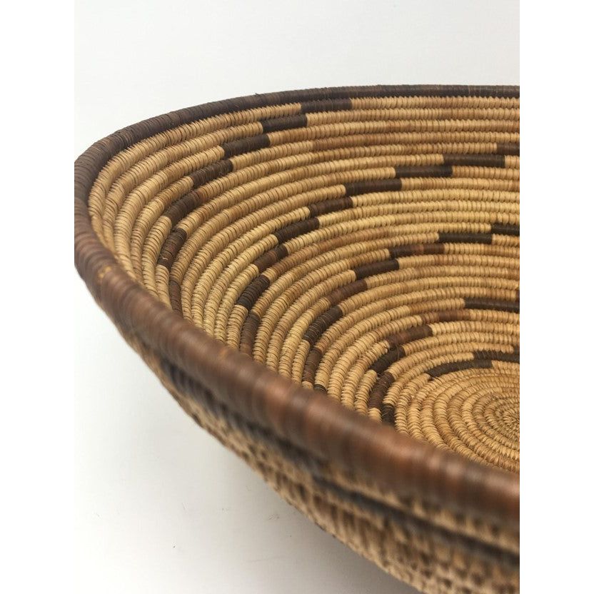 Vintage Botswana Basket with Neutral Coloration and Circular Zigzag Design in Dark Brown Measuring 13 Inches Diameter by 4.5 Inches Tall