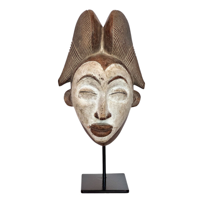 Vintage Punu Mukudji 'Maiden Spirit' Mask from Gabon with custom black metal stand.