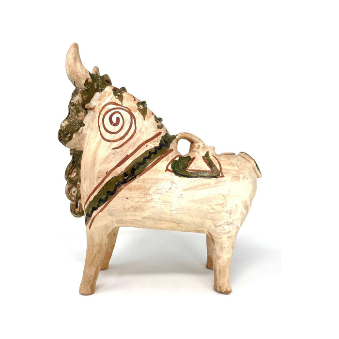 1960s ceramic Pucara bull from Peru  with hand-painted ornamentation, displaying natural color tones.